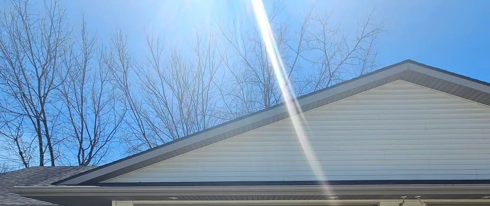 Siding, soffit, and fascia on a gable